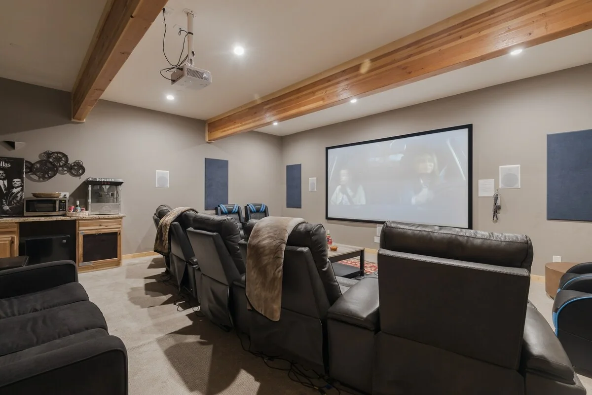Wide view of the private movie theater and projector screen