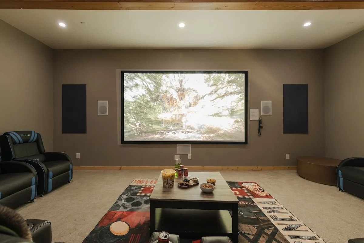 Front view of the 4K projector screen in the theater